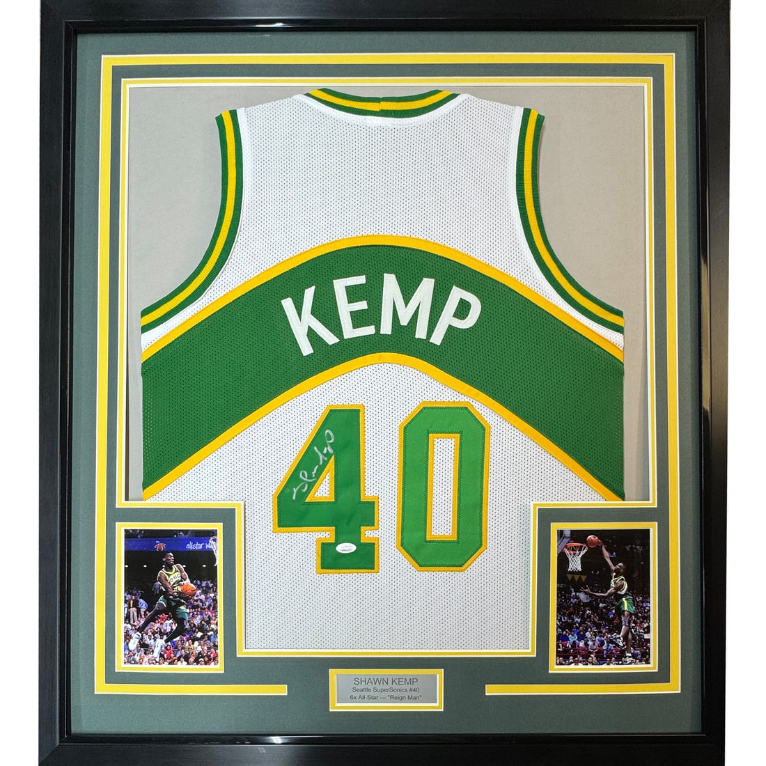 Framed Autographed Shawn Kemp Seattle SuperSonics Jersey JSA COA 33x42: Framed Autographed Shawn Kemp Seattle SuperSonics Jersey JSA COA 33x42 This professionally framed and matted jersey features the autograph of NBA legend Shawn Kemp, known for his remarkable career wit