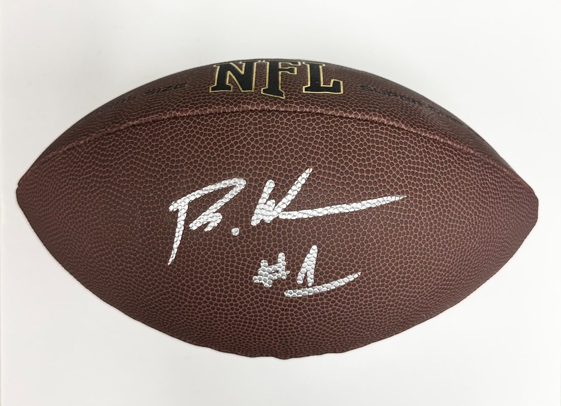 Rachaad White Signed NFL Football Buccaneers Beckett Authenticated: Rachaad White Signed NFL Football Buccaneers Beckett Authenticated This is a signed replica NFL football featuring the autograph of Rachaad White, a player for the Tampa Bay Buccaneers. The football c