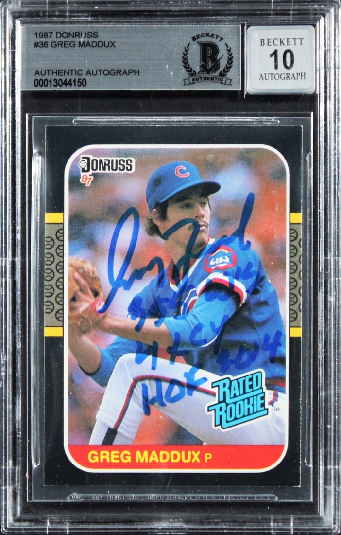 Greg Maddux Cubs 1997 Donruss #36 Beckett Slabbed Auto Card: Greg Maddux Cubs 1997 Donruss #36 Beckett Slabbed Auto Card This 1997 Donruss #36 baseball card features Greg Maddux of the Chicago Cubs and has been personally signed by Maddux. The card includes the