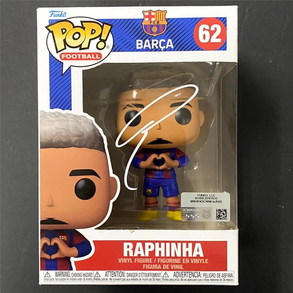 Autographed Raphinha FC Barcelona Funko Pop 62 with JSA Authentication: Autographed Raphinha FC Barcelona Funko Pop 62 with JSA Authentication This collectible Funko Pop! figure features Raphinha, the Brazilian soccer star, in his FC Barcelona kit. The item is personally 