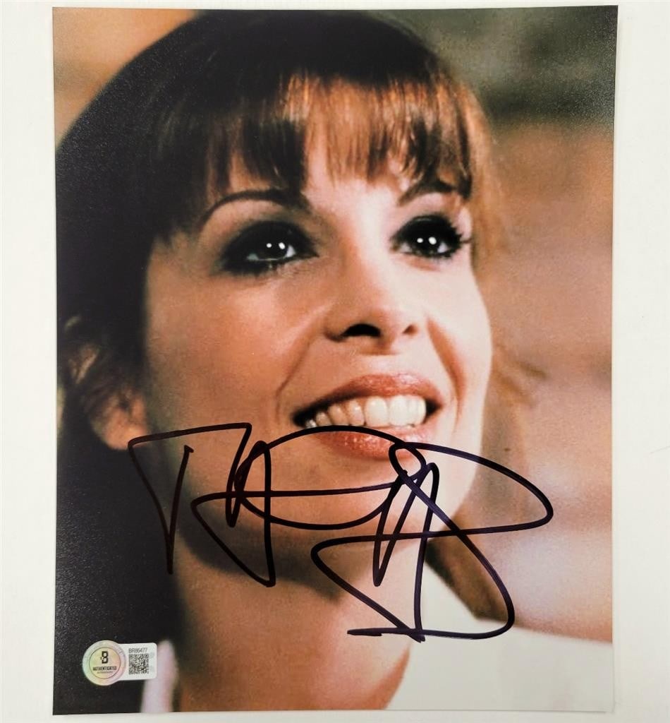 Talia Shire autographed 8x10 Rocky photograph authenticated by Beckett BAS: Talia Shire autographed 8x10 Rocky photograph authenticated by Beckett BAS This is an original 8x10 photograph signed by Talia Shire, known for her roles in the movies Rocky and The Godfather. The aut