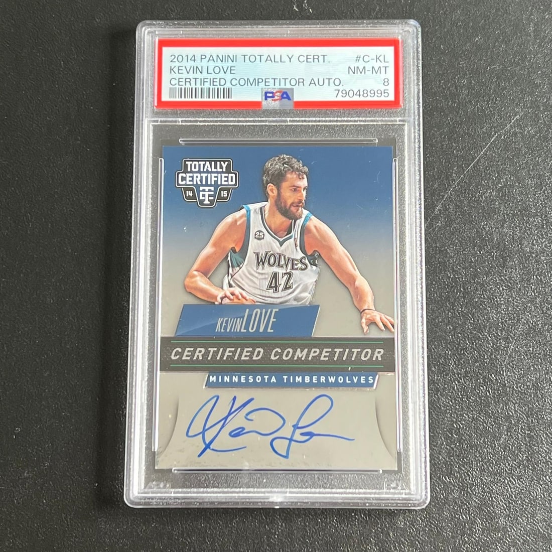 2014-15 Panini Totally Certified Kevin Love Signed Card PSA 8: 2014-15 Panini Totally Certified Kevin Love Signed Card PSA 8 This collectible card features Kevin Love, a former player for the Minnesota Timberwolves, from the 2014-15 Panini Totally Certified serie