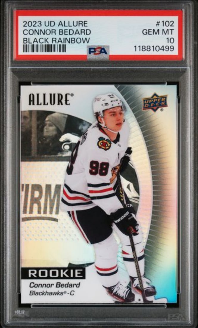 PSA 10 Black Rainbow Rookie Card 2023 Allure Connor Bedard: PSA 10 Black Rainbow Rookie Card 2023 Allure Connor Bedard This is an original 2023 Upper Deck Allure Black Rainbow Rookie Card featuring Connor Bedard of the Chicago Blackhawks. The card has been aut