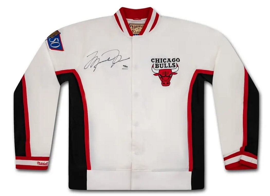 Michael Jordan Autographed 1996-97 Bulls Warm-Up Jacket Upper Deck Authenticated #/96: Michael Jordan Autographed 1996-97 Bulls Warm-Up Jacket Upper Deck Authenticated #/96 This Michael Jordan autographed warm-up jacket from the 1996-97 season is a must-have for any Chicago Bulls fan. C
