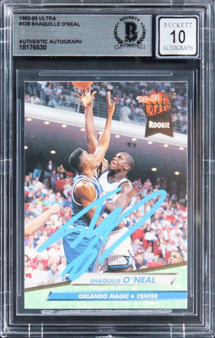 Shaquille O'Neal Signed 1992 Ultra Rookie Card Auto 10 Beckett Slabbed: Shaquille O'Neal Signed 1992 Ultra Rookie Card Auto 10 Beckett Slabbed This is a remarkable 1992 Ultra #328 Rookie Card featuring Shaquille O'Neal, personally signed by the basketball legend himself. 