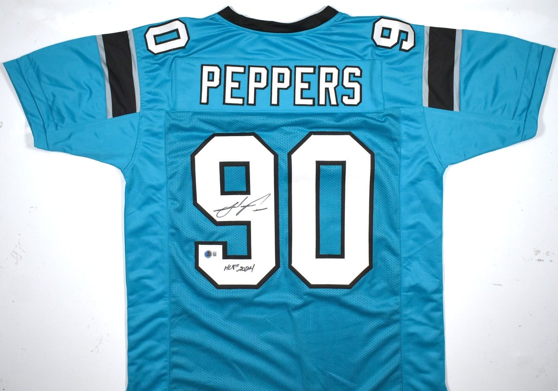 Teal Football Jersey Signed by Julius Peppers with Hall of Fame Inscription Beckett Authenticated: Teal Football Jersey Signed by Julius Peppers with Hall of Fame Inscription Beckett Authenticated This teal pro style jersey is autographed by Julius Peppers and features a Hall of Fame inscription. T