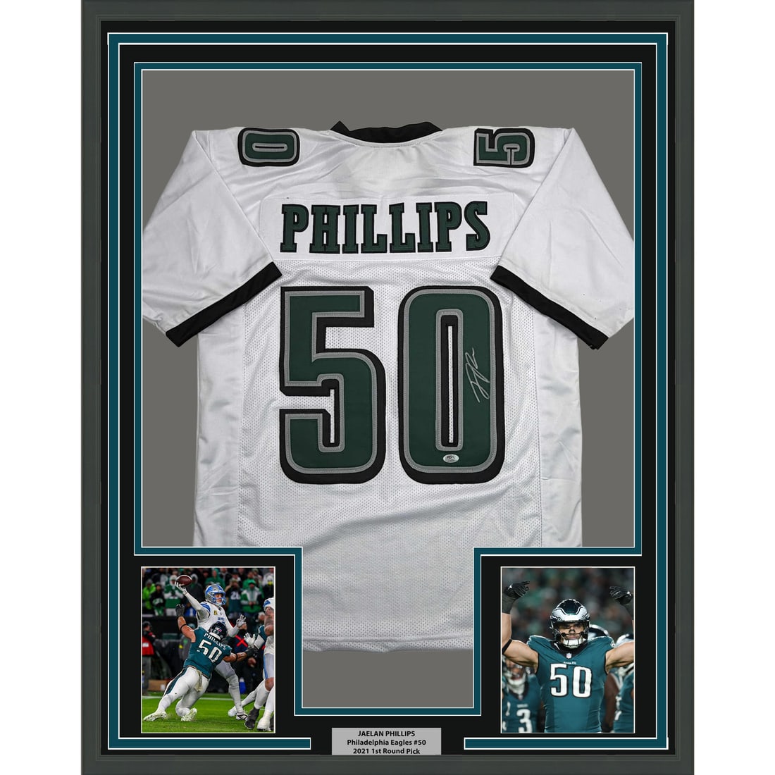 Jaelan Phillips Signed Philadelphia Eagles White Jersey in 35x39 Framed Display PSA COA: Jaelan Phillips Signed Philadelphia Eagles White Jersey in 35x39 Framed Display PSA COA This is a professionally framed and matted Philadelphia Eagles white jersey autographed by Jaelan Phillips. The 