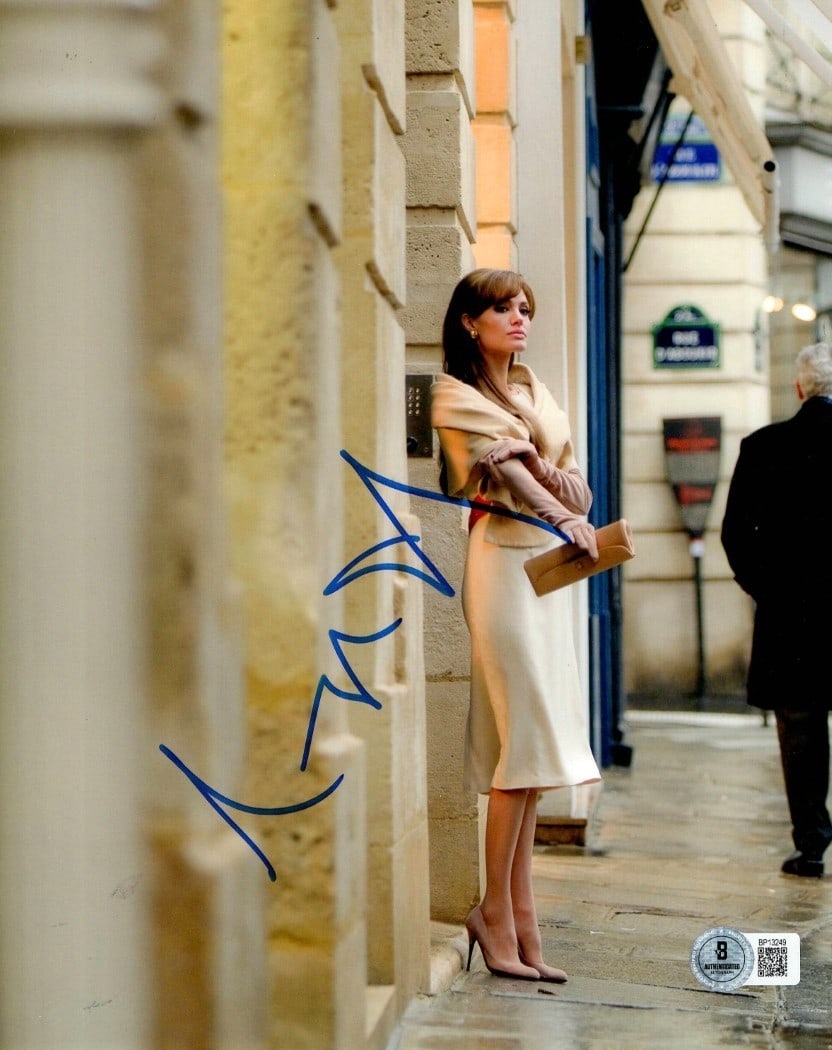Autographed Angelina Jolie 8x10 Photograph from The Tourist Beckett Authenticated: Autographed Angelina Jolie 8x10 Photograph from The Tourist Beckett Authenticated This is an 8x10 photograph from the movie The Tourist, featuring a genuine autograph by Angelina Jolie. The signature 