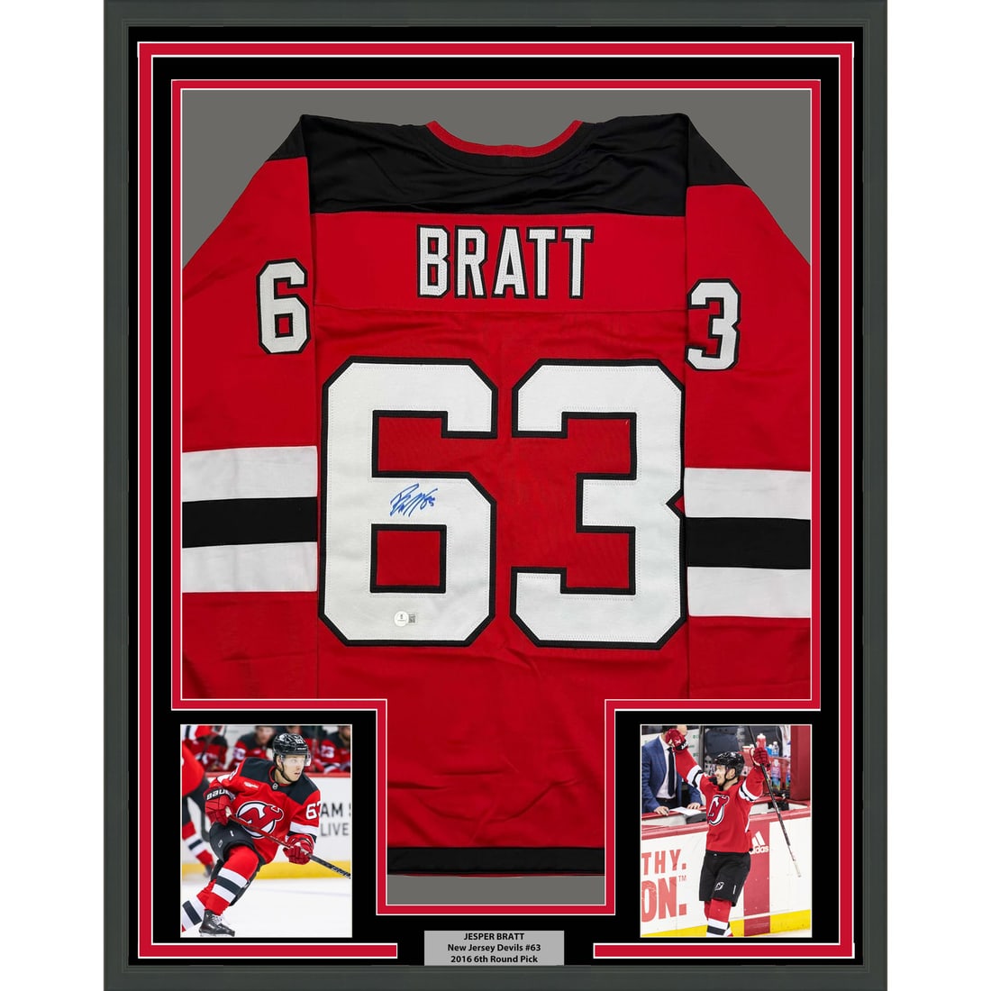 Framed Jesper Bratt Signed Red Jersey New Jersey Devils Beckett COA: Framed Jesper Bratt Signed Red Jersey New Jersey Devils Beckett COA This stunning framed autographed Jesper Bratt red hockey jersey is a must-have for any New Jersey Devils fan. Measuring 35x39 inches