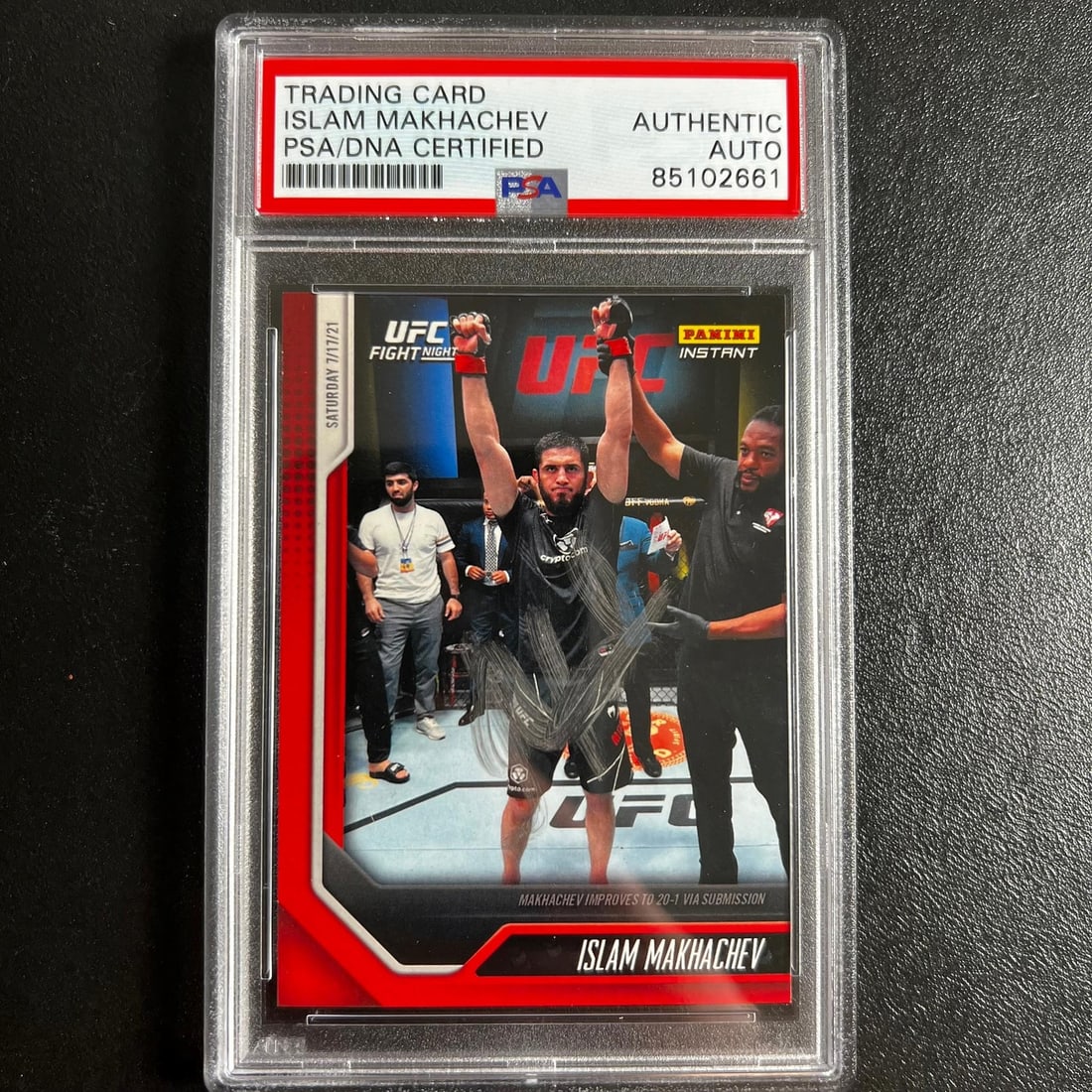 Islam Makhachev 2021 Panini Instant #26 Signed Card PSA Authenticated: Islam Makhachev 2021 Panini Instant #26 Signed Card PSA Authenticated This 2021 Panini Instant #26 card features a bold autograph from Mixed Martial Arts (MMA) fighter Islam Makhachev. The signature h