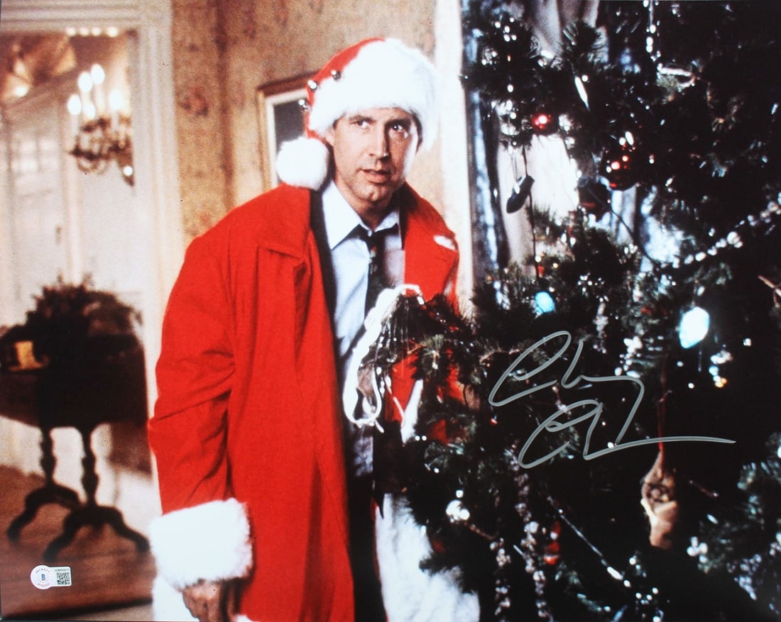 Chevy Chase Signed 16x20 Christmas Vacation Photo with Silver BAS: Chevy Chase Signed 16x20 Christmas Vacation Photo with Silver BAS Capture the holiday spirit with this authentic signed 16x20 horizontal photograph featuring Chevy Chase from the beloved movie 'Nation