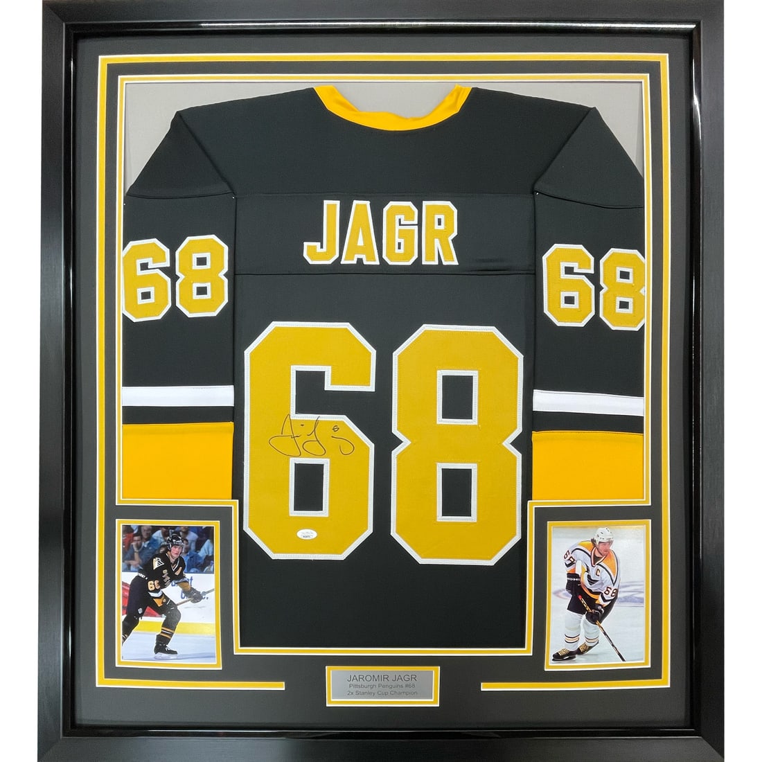 Framed Jaromir Jagr Autographed Jersey Pittsburgh Penguins JSA COA 35x39: Framed Jaromir Jagr Autographed Jersey Pittsburgh Penguins JSA COA 35x39 Celebrate the legacy of Jaromir Jagr with this professionally framed and autographed Pittsburgh Penguins black jersey. Measurin