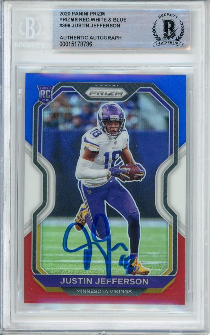 Justin Jefferson Rookie Auto Red White Blue Prizm BAS 10 Vikings Football Card: Justin Jefferson Rookie Auto Red White Blue Prizm BAS 10 Vikings Football Card This is a 2020 Panini Prizm Red, White & Blue #398 Justin Jefferson rookie card featuring an on-card autograph. The card 