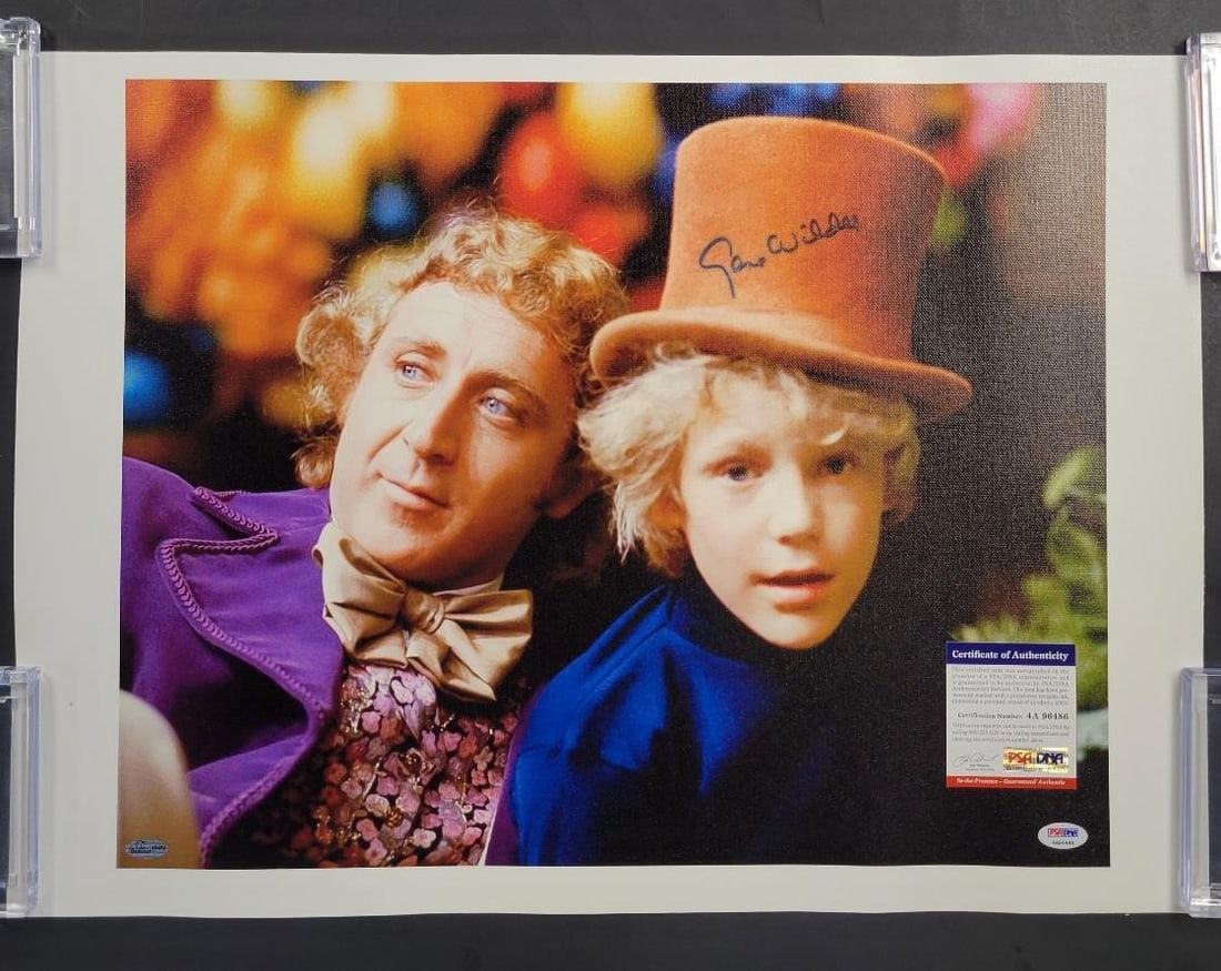 Gene Wilder Autographed Willy Wonka 16x20 Photo PSA/DNA Certified: Gene Wilder Autographed Willy Wonka 16x20 Photo PSA/DNA Certified This stunning 16x20 canvas photo features the iconic Gene Wilder, signed in his role as Willy Wonka from the classic film 'Willy Wonka