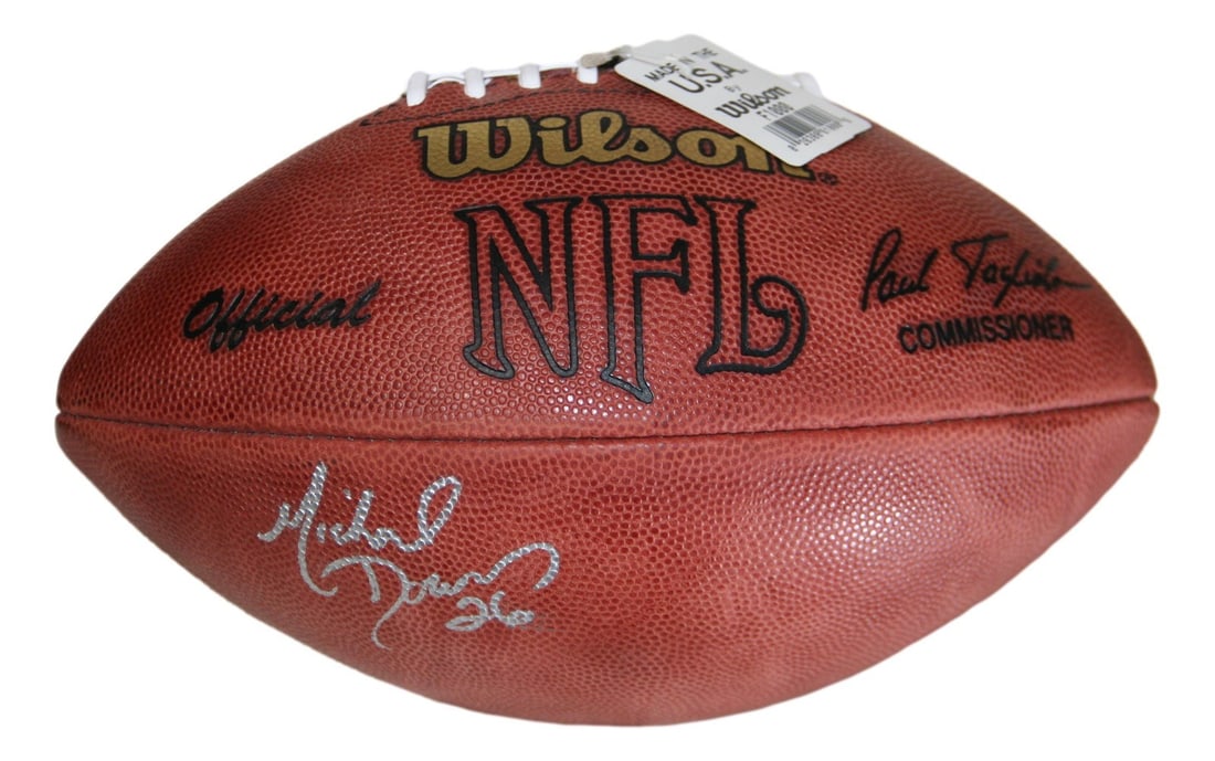 Dallas Cowboys Football Signed by Michael Downs BAS: Dallas Cowboys Football Signed by Michael Downs BAS This official NFL leather football is signed by Michael Downs of the Dallas Cowboys. The autograph has been authenticated by Beckett Authentication 