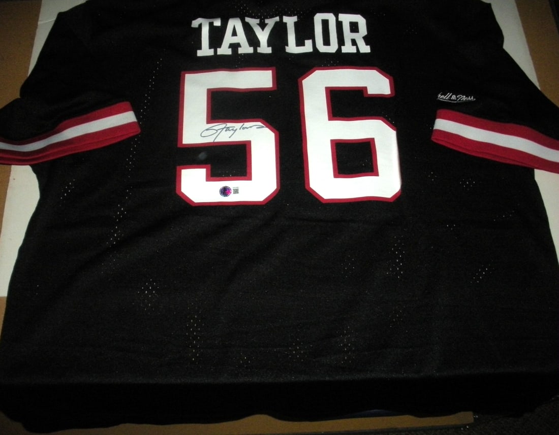Lawrence Taylor Signed Mitchell & Ness NFL Jersey with COA: Lawrence Taylor Signed Mitchell & Ness NFL Jersey with COA This officially licensed Mitchell & Ness jersey features a signature from NFL legend Lawrence Taylor, making it a must-have collectible for f