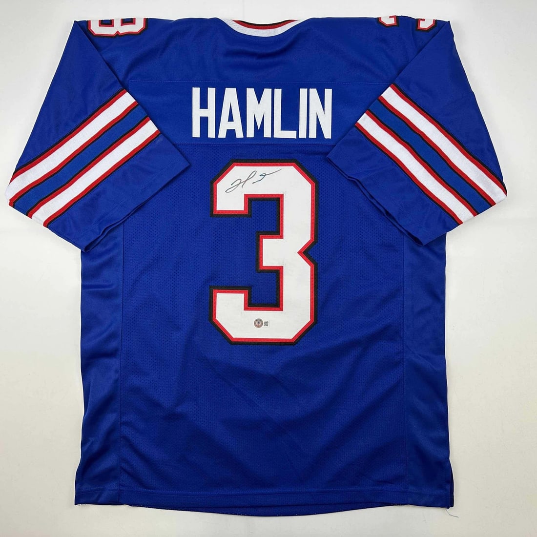 Damar Hamlin Signed Buffalo Blue Football Jersey Beckett COA: Damar Hamlin Signed Buffalo Blue Football Jersey Beckett COA Celebrate the legacy of Damar Hamlin with this autographed Buffalo Bills blue football jersey. This original piece features authentic