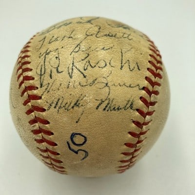 1951 Yankees Team Signed Baseball with Mickey Mantle PSA Authentication: 1951 Yankees Team Signed Baseball with Mickey Mantle PSA Authentication Celebrate the legacy of the New York Yankees with this remarkable team-signed baseball from the 1951 World Series Champions. Thi