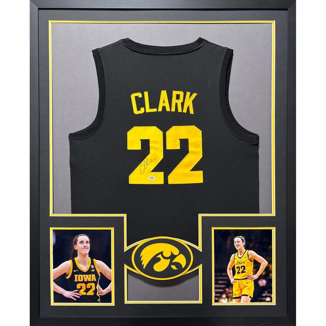 Framed Iowa Hawkeyes Black Jersey Signed by Caitlin Clark PSA/DNA Authenticated: Framed Iowa Hawkeyes Black Jersey Signed by Caitlin Clark PSA/DNA Authenticated This framed Iowa Hawkeyes black jersey is autographed by Caitlin Clark and authenticated by PSA/DNA, featuring a tamper-