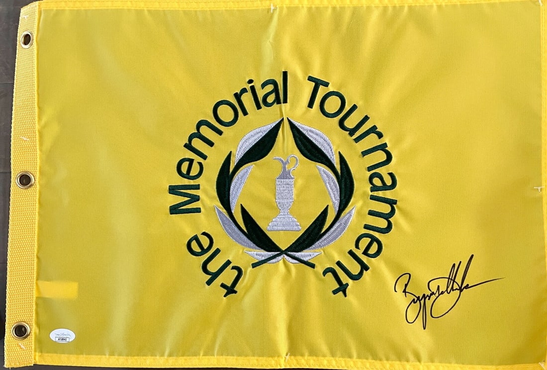 Bryson DeChambeau Signed Memorial Tournament Flag JSA Authenticated: Bryson DeChambeau Signed Memorial Tournament Flag JSA Authenticated This is an official pin flag from The Memorial Tournament, signed by professional golfer Bryson DeChambeau. The autograph has been a