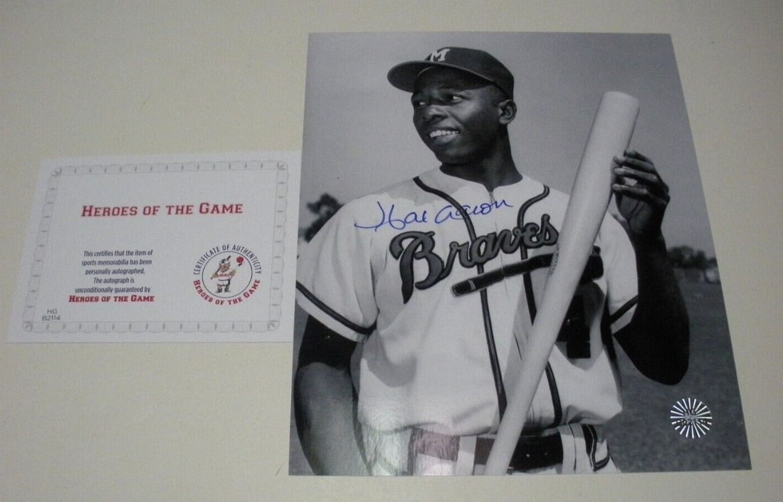 Hank Aaron Signed 8x10 Braves Photo with COA Hall of Fame Autograph: Hank Aaron Signed 8x10 Braves Photo with COA Hall of Fame Autograph This is an original 8x10 photograph signed by Hank Aaron, legendary Atlanta Braves player and Hall of Famer. The photo comes with a 