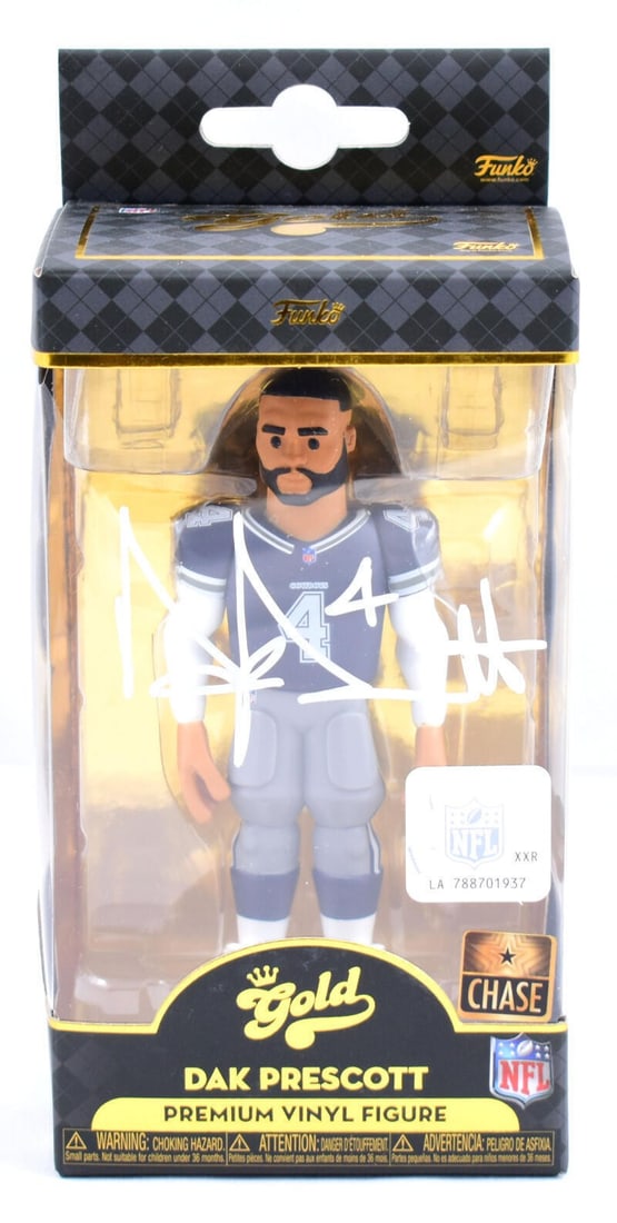 Dak Prescott Signed Funko Vinyl Figure Beckett Authenticated: Dak Prescott Signed Funko Vinyl Figure Beckett Authenticated This collectible Dak Prescott Funko Vinyl figure is part of the Gold Legends series. Featuring the talented quarterback of the Dallas Cowbo