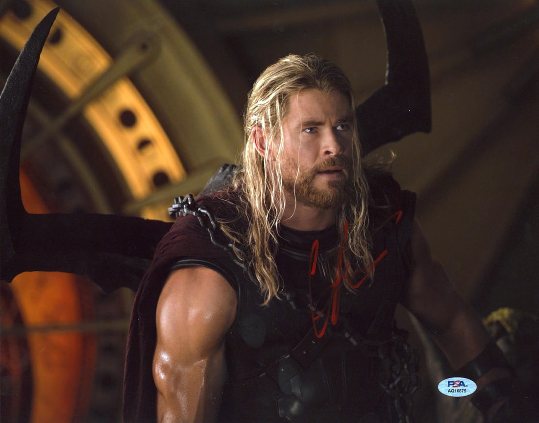 Chris Hemsworth Signed 11x14 Thor Ragnarok Photo PSA DNA Authenticated: Chris Hemsworth Signed 11x14 Thor Ragnarok Photo PSA DNA Authenticated This 11x14 horizontal photograph from Thor Ragnarok features an authentic signature by Chris Hemsworth. The item has been fully a