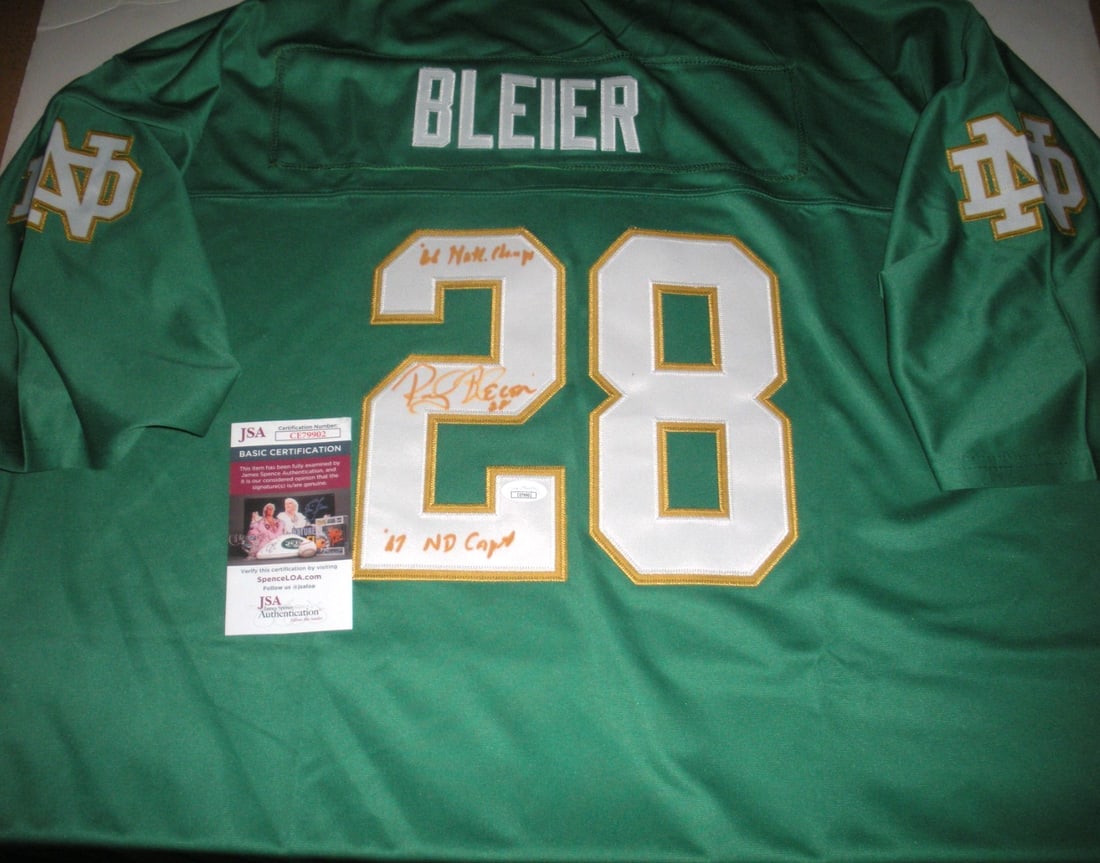 Rocky Bleier Signed Notre Dame Under Armour Jersey JSA COA: Rocky Bleier Signed Notre Dame Under Armour Jersey JSA COA This officially licensed Under Armour jersey features the signature of Rocky Bleier, a notable player from Notre Dame. Ideal for collectors a