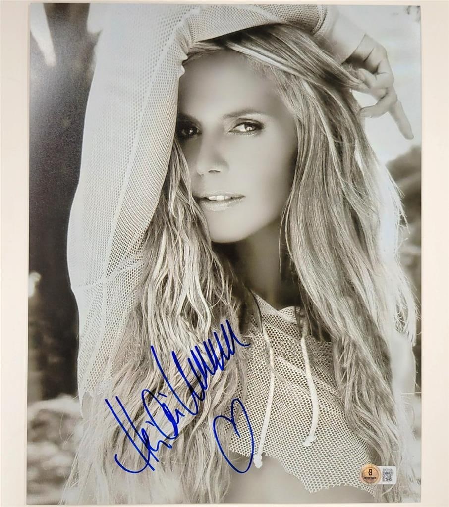 Heidi Klum Signed 11x14 Photo Victoria's Secret Beckett Authenticated: Heidi Klum Signed 11x14 Photo Victoria's Secret Beckett Authenticated This is an original 11x14 photograph of Heidi Klum, a renowned Victoria's Secret model, featuring her autograph authenticated by B