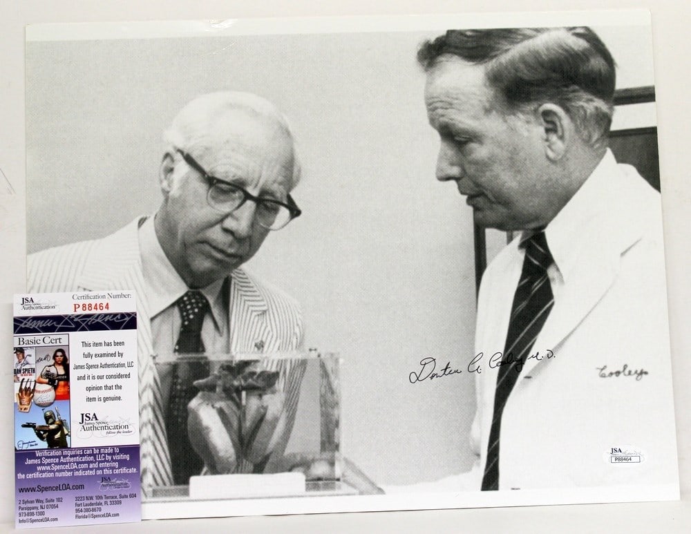 11x14 Photograph Signed by Dr. Denton A. Cooley JSA Authenticated: 11x14 Photograph Signed by Dr. Denton A. Cooley JSA Authenticated This is an original 11x14 photograph signed by renowned heart surgeon Dr. Denton A. Cooley. The autograph has been authenticated by Ja