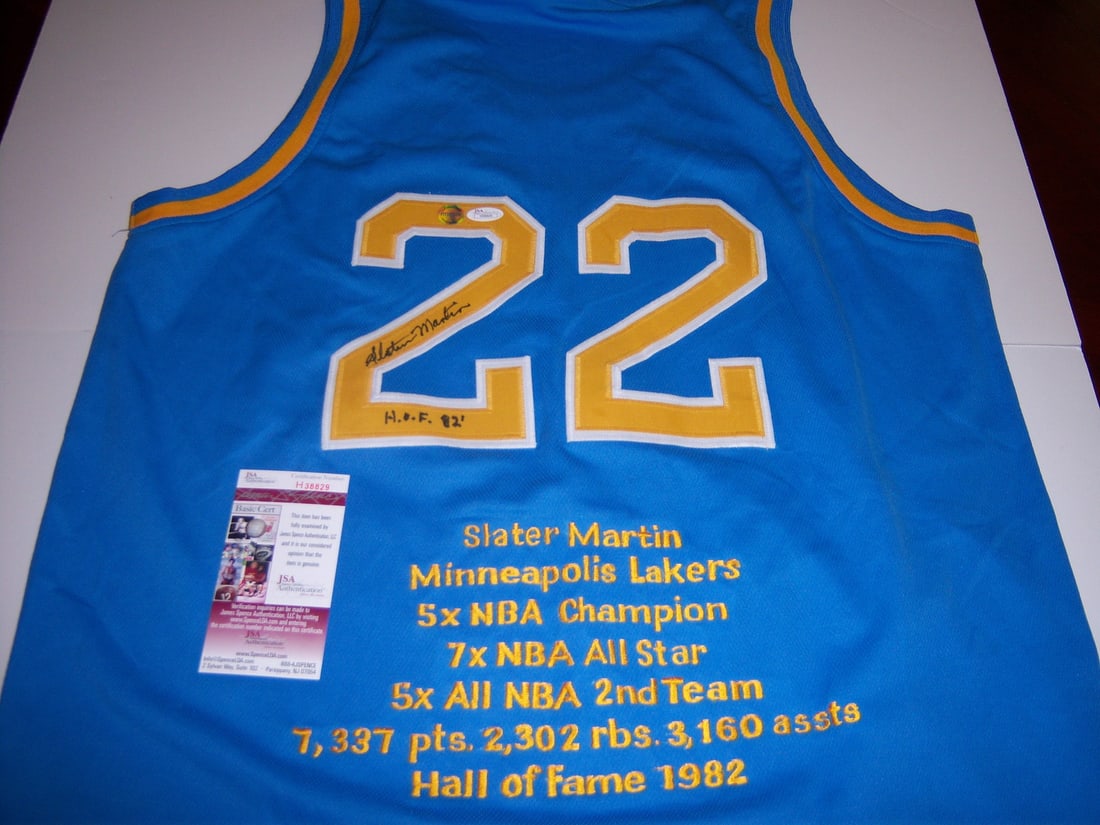 Slater Martin Signed Jersey Texas Longhorns JSA/COA Basketball Collectible: Slater Martin Signed Jersey Texas Longhorns JSA/COA Basketball Collectible This is a signed basketball jersey featuring Slater Martin, a notable player for the Minneapolis Lakers and Texas Longhorns. 