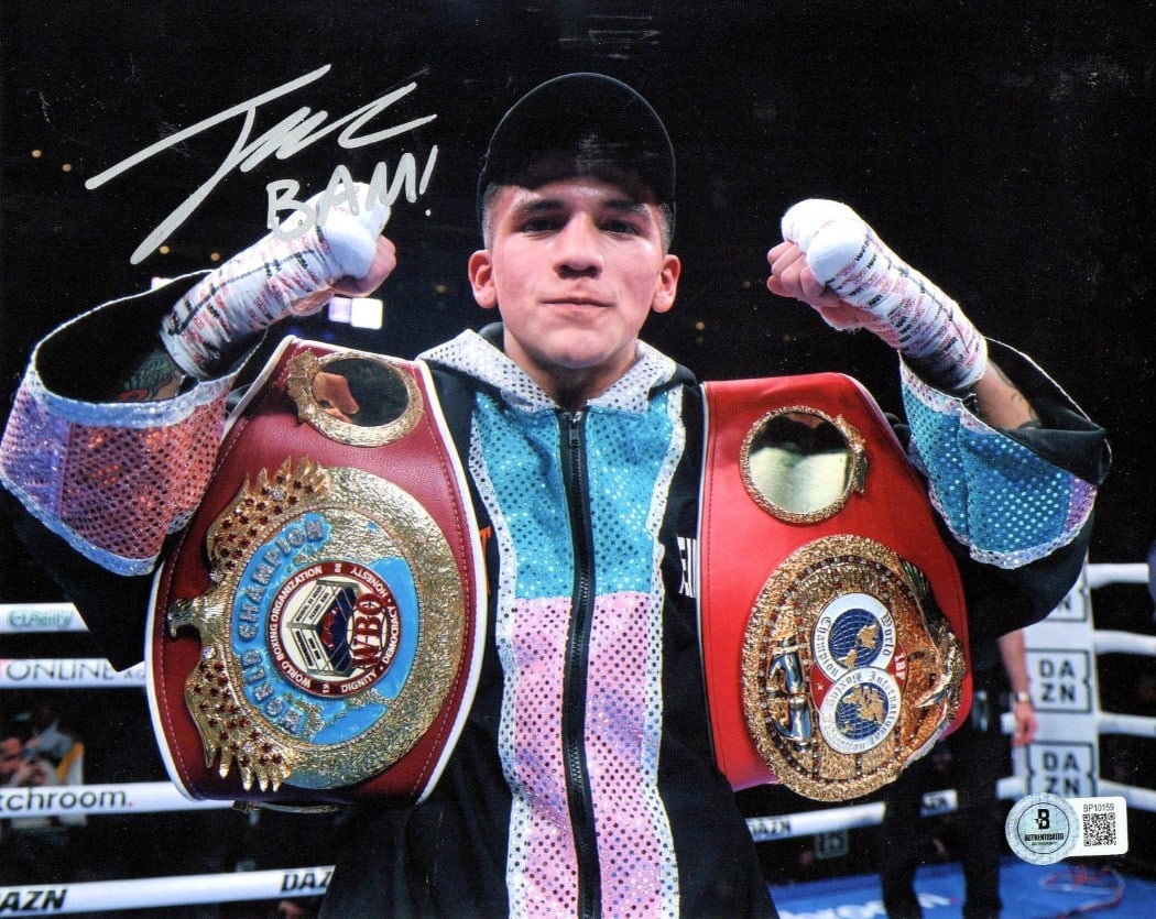 Jesse Rodriguez Signed 8X10 Boxing Photo IBF WBC Beckett Authenticated: Jesse Rodriguez Signed 8X10 Boxing Photo IBF WBC Beckett Authenticated Celebrate the achievements of boxing champion Jesse Rodriguez with this autographed 8x10 photo featuring him holding his IBF and 