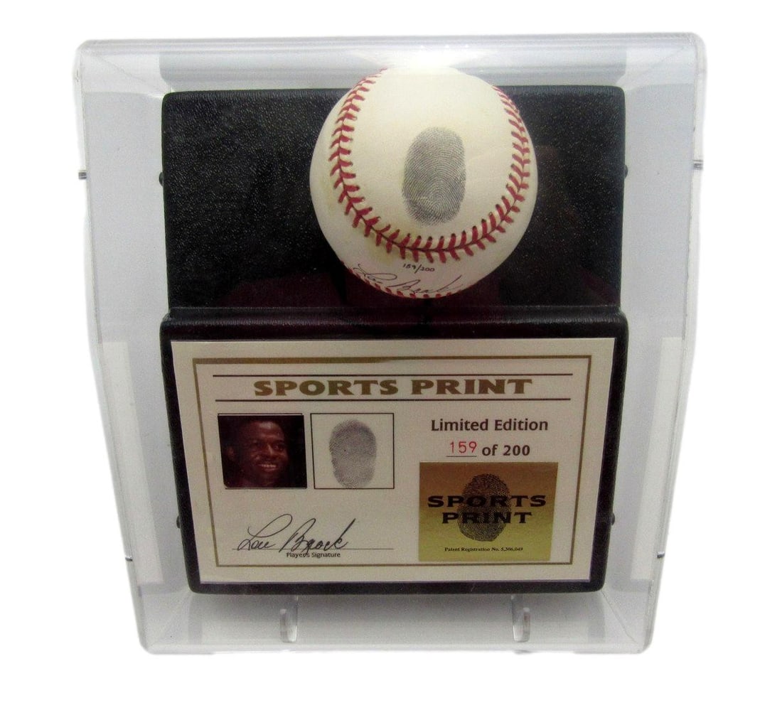 Lou Brock signed thumbprint baseball Sports Print BAS 159 of 200: Lou Brock signed thumbprint baseball Sports Print BAS 159 of 200 This rare collectible features a Lou Brock autographed and thumbprinted baseball, limited to only 200 pieces produced by Sports Print i