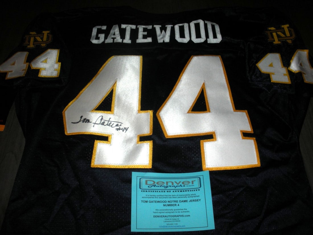 Tom Gatewood Notre Dame Signed Wilson Jersey with COA: Tom Gatewood Notre Dame Signed Wilson Jersey with COA This official licensed Wilson jersey is a must-have collectible for fans of Tom Gatewood and the Notre Dame Irish. Featuring a vibrant design, thi