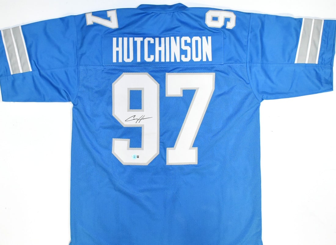 Signed Detroit Lions Blue Jersey by Aidan Hutchinson Beckett Authenticated: Signed Detroit Lions Blue Jersey by Aidan Hutchinson Beckett Authenticated This is a pre-owned blue Pro Style jersey autographed by Aidan Hutchinson. The jersey comes authenticated with a Beckett Witn
