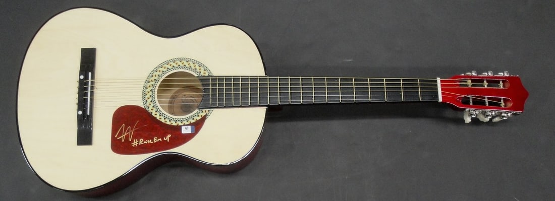 38 Inch Guitar Signed by Austin Webb with Global Authentics COA: 38 Inch Guitar Signed by Austin Webb with Global Authentics COA This is a 38-inch guitar hand signed by country superstar Austin Webb. The autograph has been authenticated by Global Authentics (GAI). 
