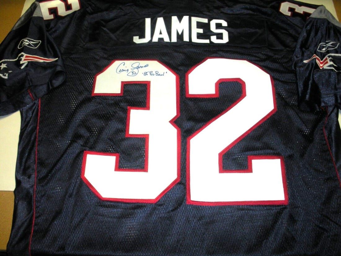 Craig James Autographed Reebok Patriots Jersey with COA: Craig James Autographed Reebok Patriots Jersey with COA This official licensed Reebok New England Patriots jersey features the authentic signature of Craig James. The jersey comes with a certificate o