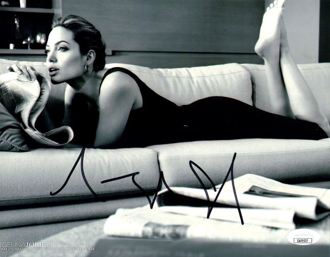 8x10 Black and White Photograph Signed by Angelina Jolie JSA Authenticated: 8x10 Black and White Photograph Signed by Angelina Jolie JSA Authenticated This is an original 8x10 black and white photograph autographed by Angelina Jolie. The photo has been authenticated by James 