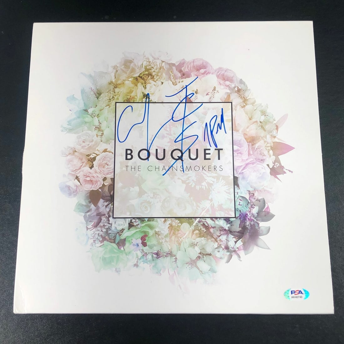The Chainsmokers Bouquet LP Vinyl Signed by ALEX PALL ANDREW TAGGART PSA/DNA: The Chainsmokers Bouquet LP Vinyl Signed by ALEX PALL ANDREW TAGGART PSA/DNA This listing features a signed album cover of The Chainsmokers' Bouquet, autographed by the duo ALEX PALL and ANDREW TAGGAR