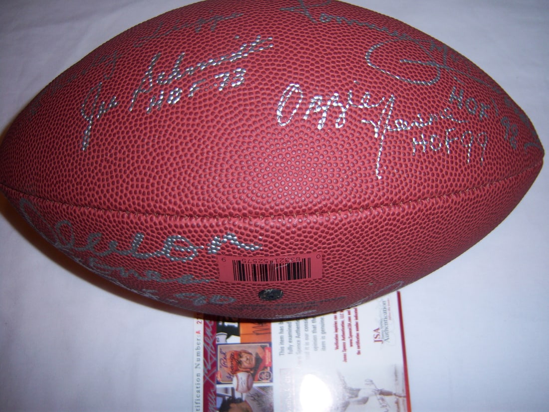 JSA authenticated NFL football signed by Dawson Jones Newsome Schmidt and four others (1 of 3)