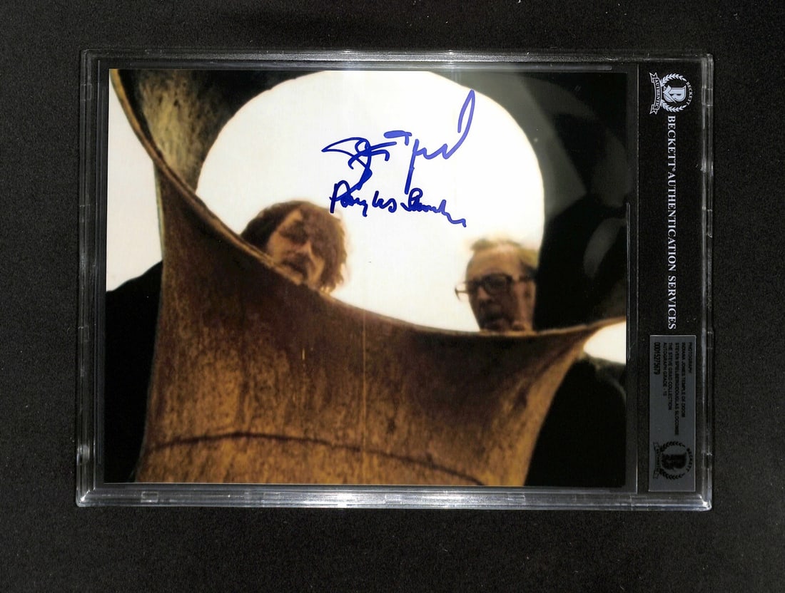 Indiana Jones Multi Signed 8x10 Photo by Spielberg and Slocombe BAS 10: Indiana Jones Multi Signed 8x10 Photo by Spielberg and Slocombe BAS 10 This autographed 8x10 color photograph features the iconic signatures of director Steven Spielberg and cinematographer Douglas Sl
