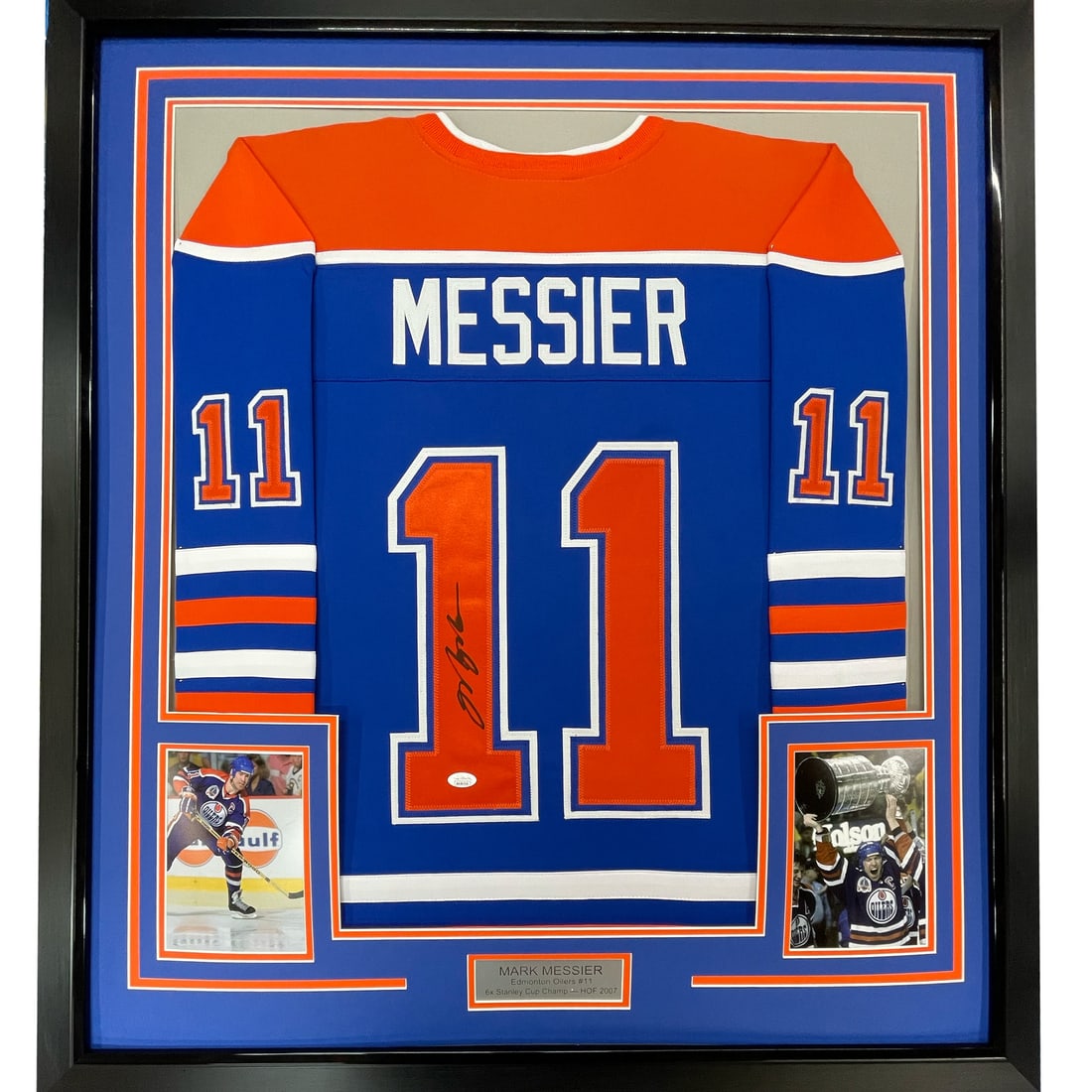 Framed Signed Mark Messier Edmonton Oilers Jersey with JSA COA: Framed Signed Mark Messier Edmonton Oilers Jersey with JSA COA Celebrate a hockey legend with this professionally framed and autographed Mark Messier jersey. This striking Edmonton Oilers blue jersey,
