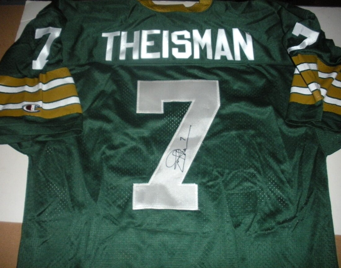 Notre Dame Irish Champion Jersey Signed by Joe Theismann with COA: Notre Dame Irish Champion Jersey Signed by Joe Theismann with COA This official licensed Champion jersey is signed by Joe Theismann and features the Notre Dame Irish team design. The jersey comes with