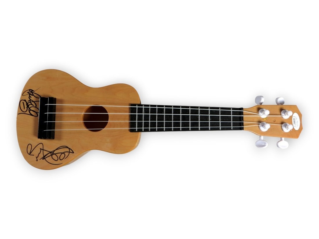 Rudy Sarzo Johnny Kelly Autographed Ukulele JSA Certified: Rudy Sarzo Johnny Kelly Autographed Ukulele JSA Certified This is an authentic autographed ukulele signed by renowned musicians Rudy Sarzo and Johnny Kelly. The signature has been authenticated by Jam