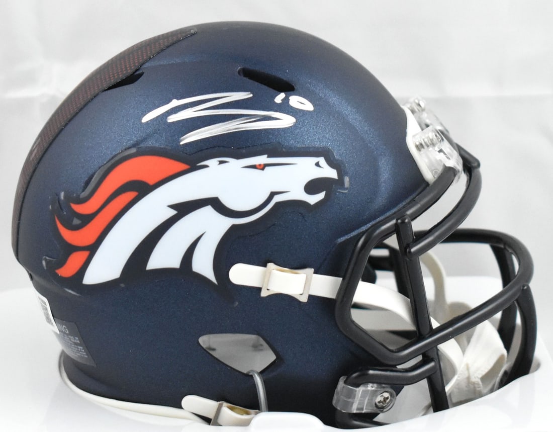 Denver Broncos Mini Speed Helmet Signed by Bo Nix Beckett Authenticated: Denver Broncos Mini Speed Helmet Signed by Bo Nix Beckett Authenticated This Denver Broncos Speed mini helmet is autographed by Bo Nix. The helmet comes with Beckett Authentication Services (BAS) holo