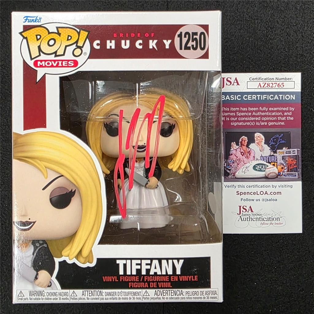 Jennifer Tilly Autographed Tiffany Funko Pop Bride of Chucky JSA Authenticated: Jennifer Tilly Autographed Tiffany Funko Pop Bride of Chucky JSA Authenticated This is an original Bride of Chucky Tiffany Funko Pop! figure, number 1250, signed by Jennifer Tilly in red ink. The auto