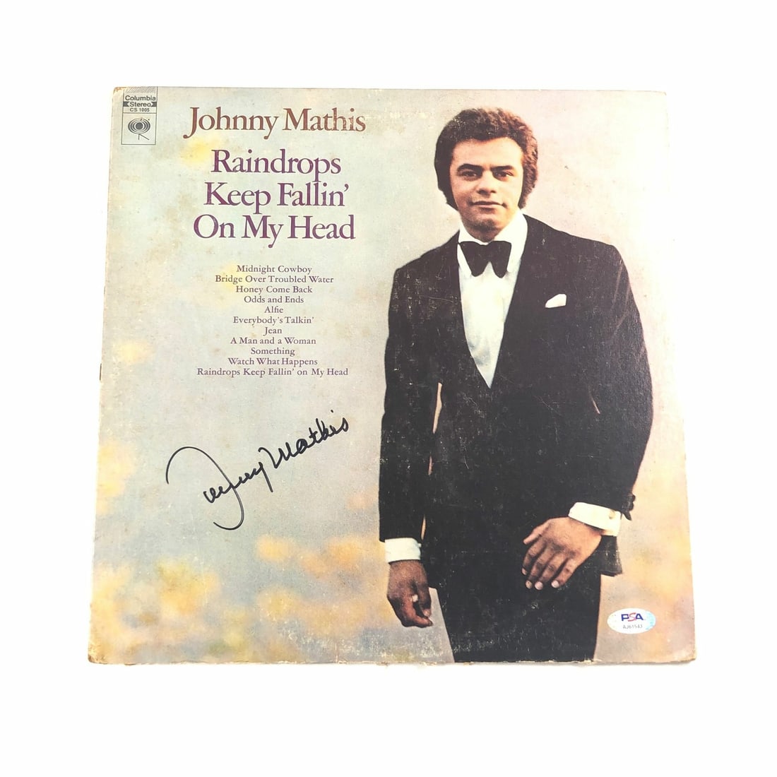Johnny Mathis Signed Vinyl LP Raindrops Keep Fallin' PSA/DNA Authentic: Johnny Mathis Signed Vinyl LP Raindrops Keep Fallin' PSA/DNA Authentic This is a Raindrops Keep Fallin' on My Head vinyl album cover, personally signed by the legendary Johnny Mathis. The autograph ha