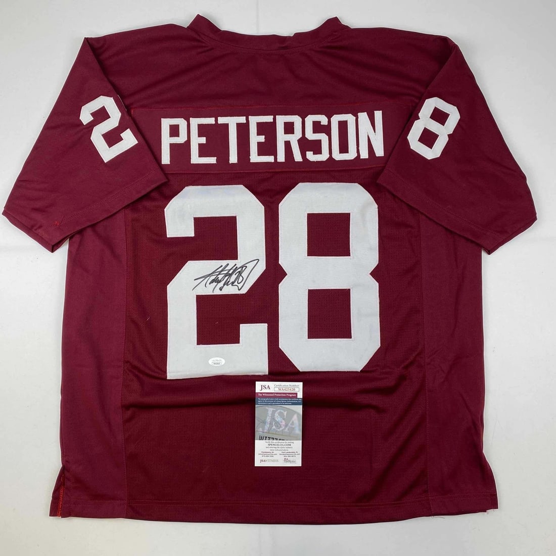 Adrian Peterson Signed Oklahoma Sooners Maroon Jersey JSA Authenticated: Adrian Peterson Signed Oklahoma Sooners Maroon Jersey JSA Authenticated Celebrate the legacy of Adrian Peterson with this autographed Oklahoma Sooners maroon college jersey. This original, custom jers
