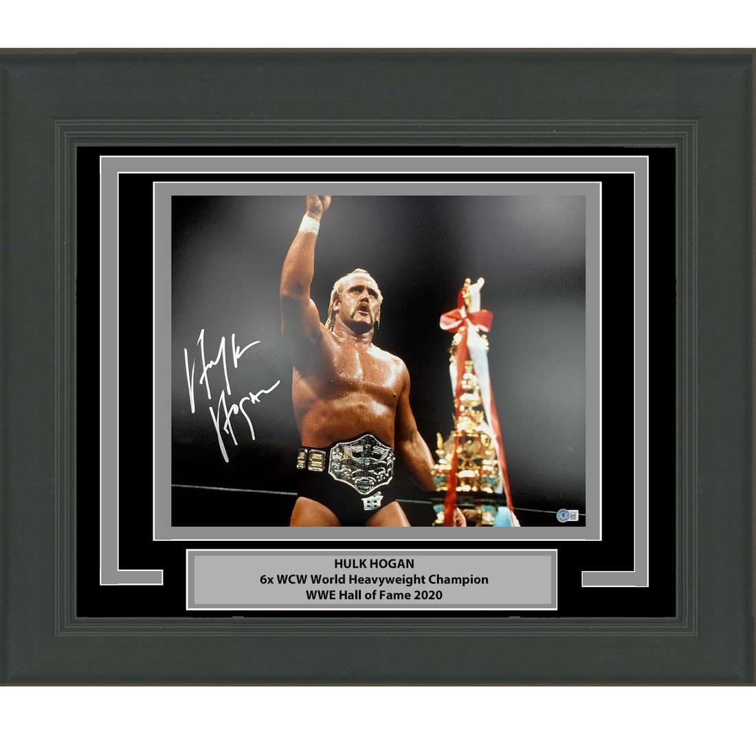 Hulk Hogan Signed 16x20 WWE WWF Photo Framed Beckett Authenticated: Hulk Hogan Signed 16x20 WWE WWF Photo Framed Beckett Authenticated This framed 16x20 photo features an authentic autograph from Hulk Hogan, a renowned WWE and WWF athlete. The item has been profession