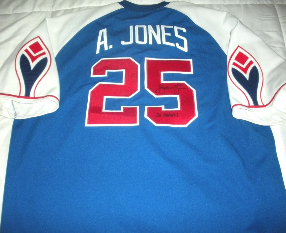 Autographed Cooperstown Collection Jersey With COA Andruw Jones Atlanta Braves: Autographed Cooperstown Collection Jersey With COA Andruw Jones Atlanta Braves This is an official licensed Cooperstown Collection jersey featuring Andruw Jones of the Atlanta Braves. The jersey is ha
